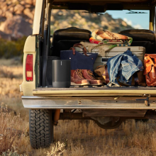 SONOS Move can be taken out and about with you.  Here it's pictured in the back of a jeep out in the mountains.