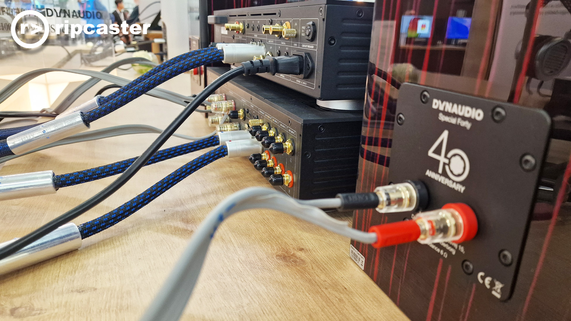 Rear view of some HiFi units with the cables plugged into the back