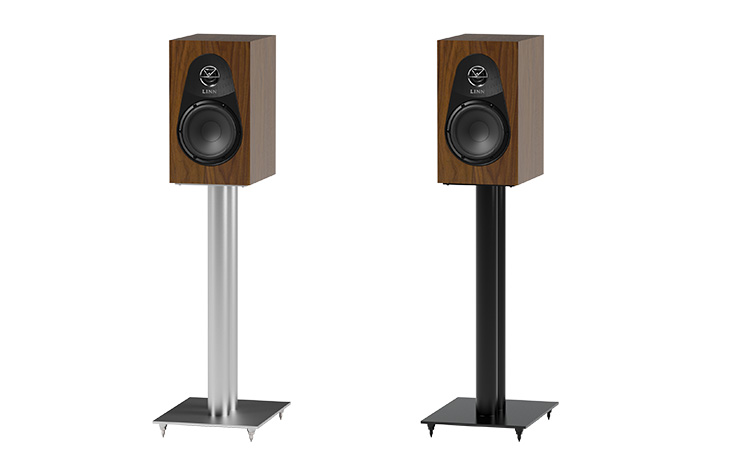 A pair of Linn 119 speakers. The left one is on a silver stand and the one on the right is on a black stand