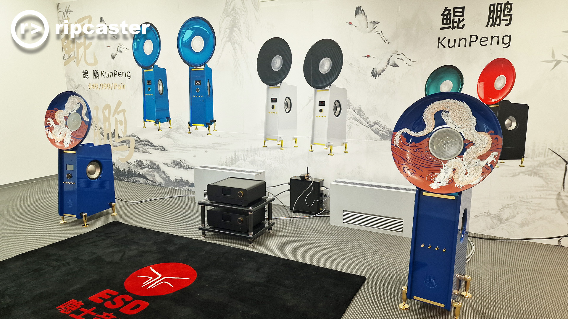 Those artistic speaker discs again.  This time mounted onto a speaker base with HiFi units between them.  The design is of a cinese dragon and features blue and terracota