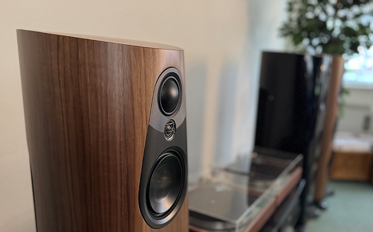 Linn 360 speaker in walnut at the ripcaster showroom with a pair of record players beside it