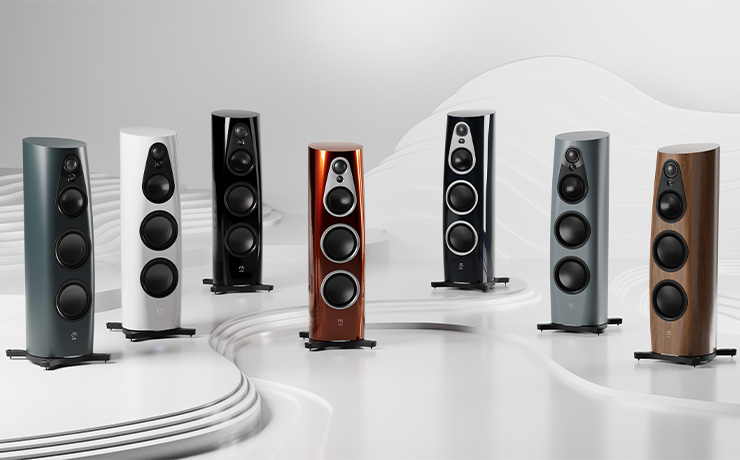 the range of Linn 360 speaker finishes - there are seven - from left to right Triton, Alpine White (probably Piano Black but it's hard to tell the difference between Heritage and Black in certain light), Single Malt, Linn Heritage (an assumption), Clyde Built and Walnut