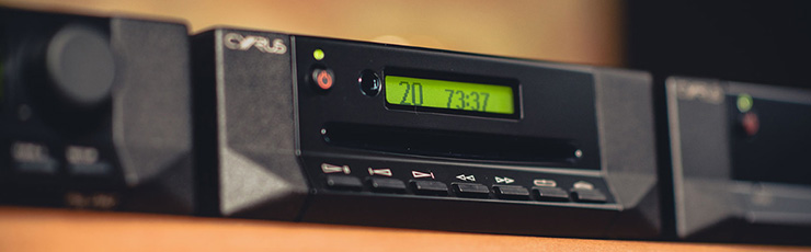 Cyrus CDt between two other Cyrus products on a wooden unit