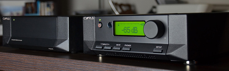 Cyrus Classic Pre-amplifier beside another piece of Cyrus equipment on a wooden shelf
