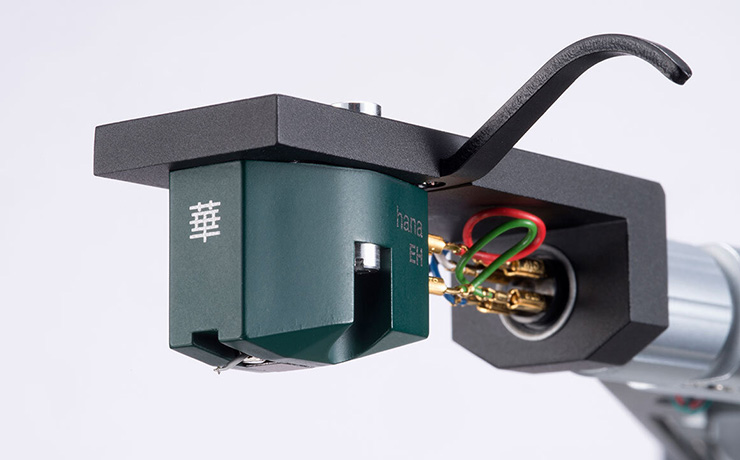 The Hana EH cartridge fitted to a tonearm. The cartridge is a forest green colour