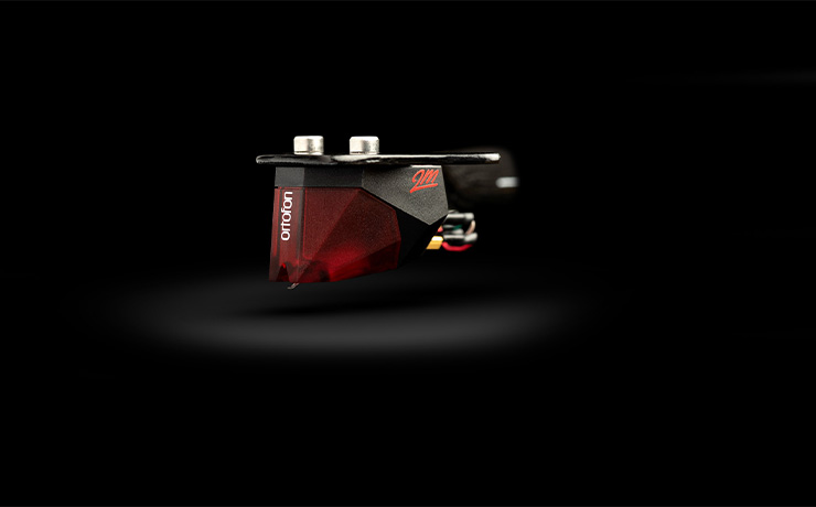 The Ortofon 2M Red cartridge on a black background
