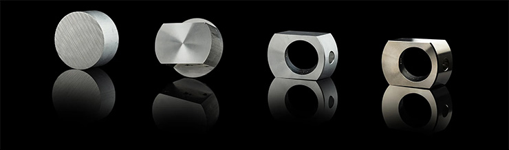 Four images showing the stages of the aluminium black that becomes the tonearm bearing