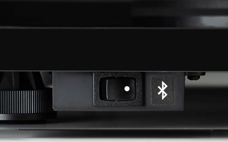 The rear of the turntable showing the Bluetooth logo