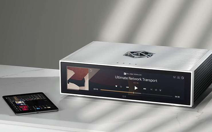 HiFi Rose RS130 on a white table with an iPad in front of it.