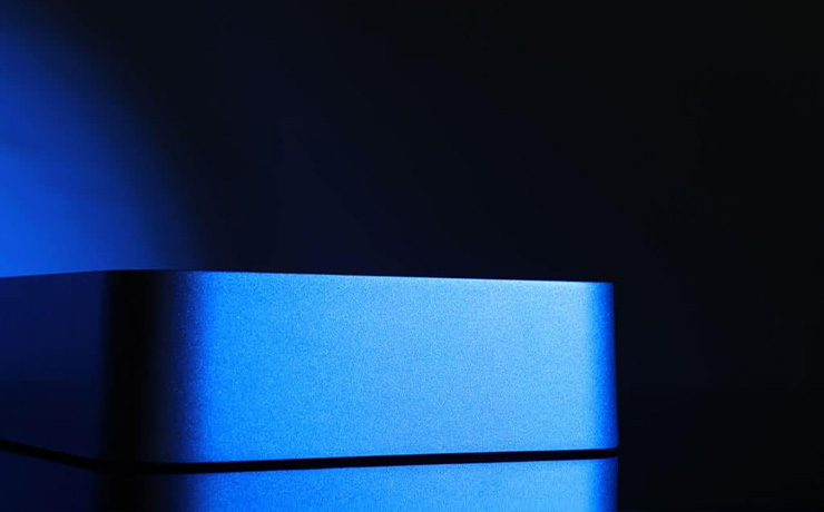 The Silent Angel Rhein with blue lighting.  It's a small silver box shape with rounded corners