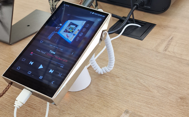 The A&K SP3000T at the Munich HiFi Show in 2024 on a stand with headphones plugged into it.