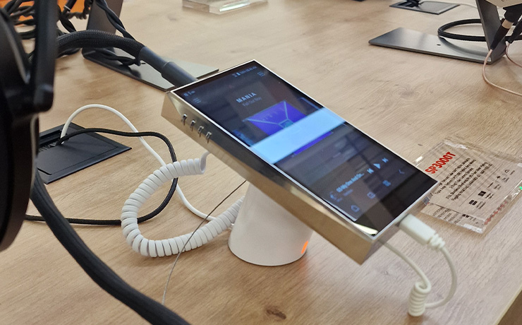 The A&K SP3000T at the Munich HiFi Show on a stand with headphones plugged in.