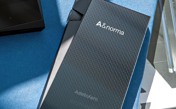 Astell & Kern A&norma SR35 Portable Music Player rear view on a blue background