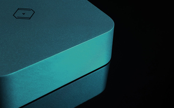 Silent Angel Forester FPC Linear Power Supply in silver with blue lighting that reflects off the unit