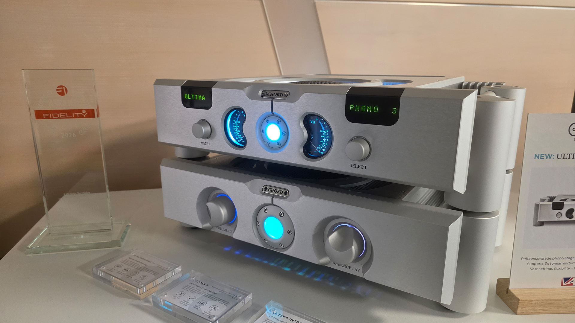 two HiFi units in silver, one on top of the other