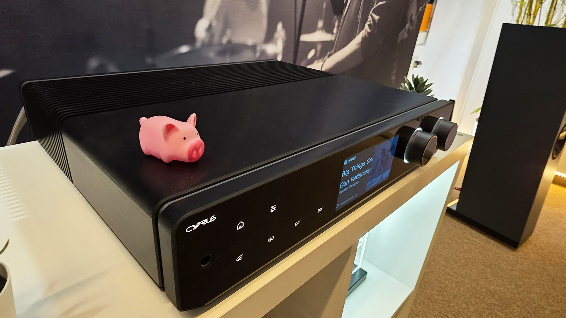 A Cyrus 80 unit on a wooden HiFi unit