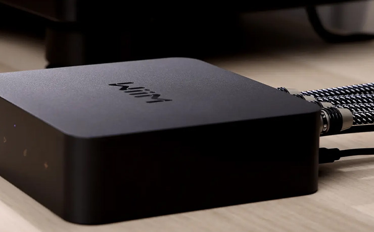 WiiM Pro on a table with cables connected